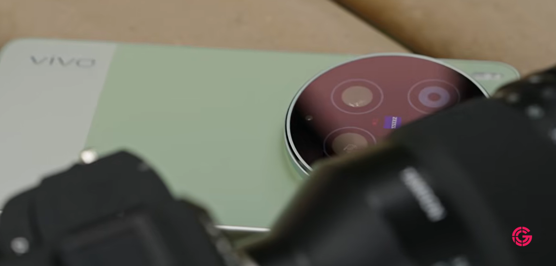Close-up of the Vivo X300 Ultra camera module with a blurred camera in the foreground