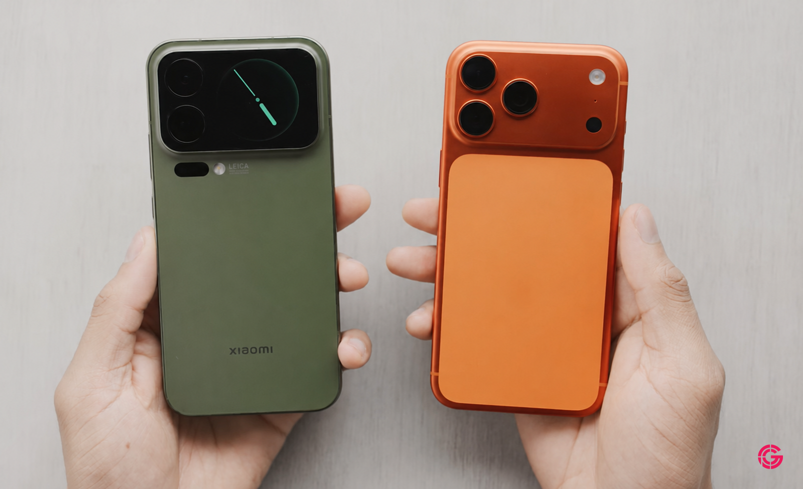 Xiaomi 17 Pro Max held next to an iPhone 17 Pro Max from the back
