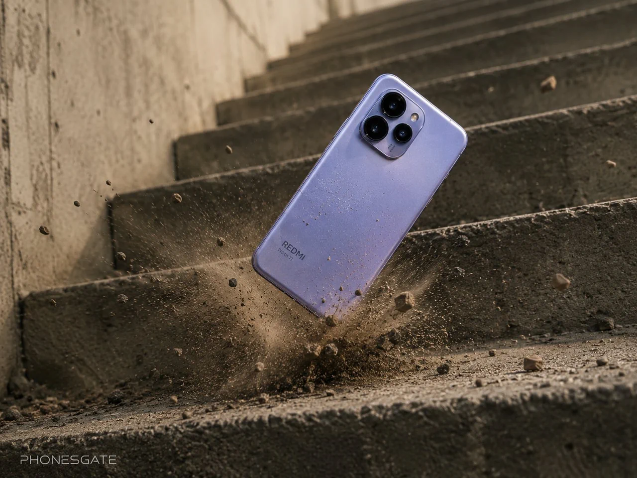 Redmi Note 17 hitting concrete stairs in a drop test concept image